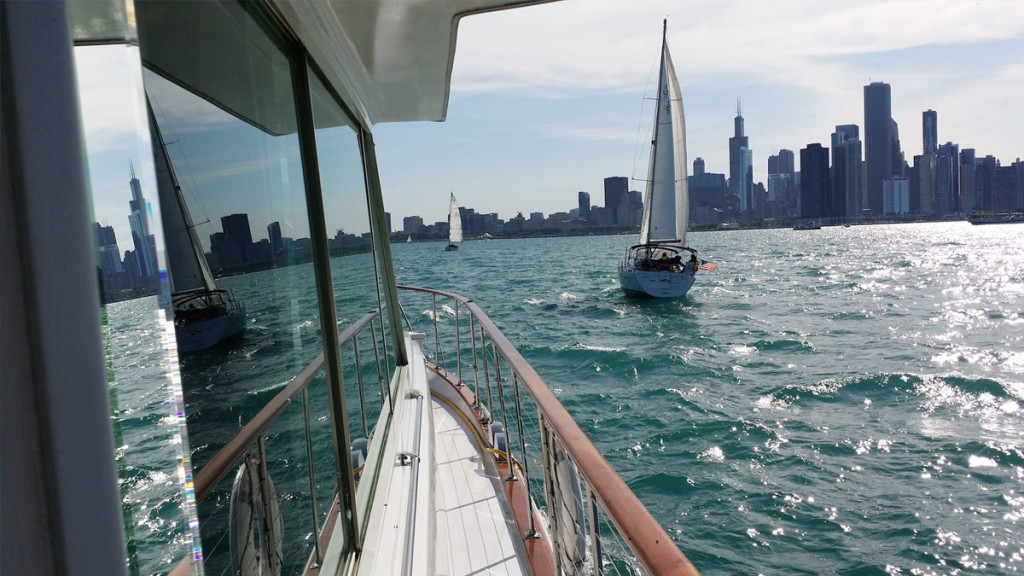 next to chicago skyline from luxury yacht
